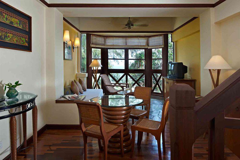 Avillion Port Dickson Hotel Bagian luar foto A living room in a suite at the Shangri-La Tanjung Rhu Resort, Langkawi, Malaysia